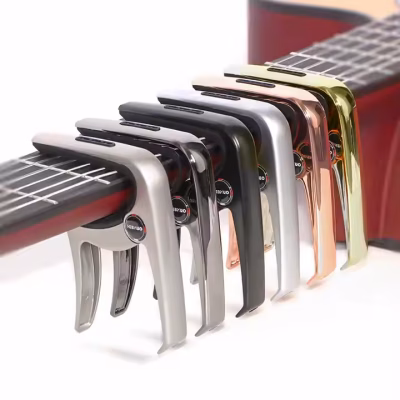 Hebikuo BDJ-56 Acoustic/Electric Guitar Capo With Pin Remova and pick